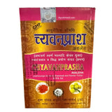 Packaging of Kalera Kaleda Chyawanprash Avaleha, showing the container and the box with the product name and description in Hindi.