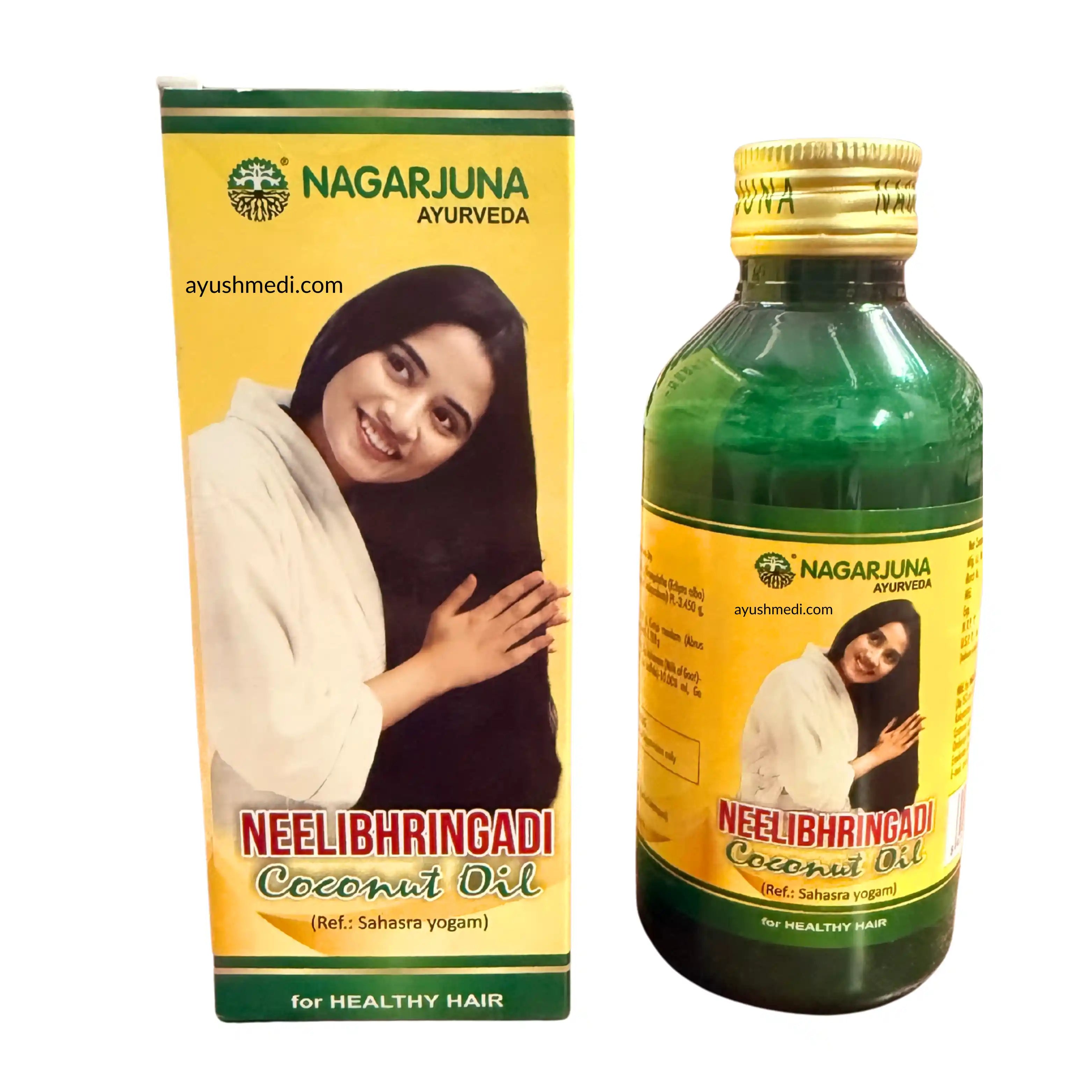 Nagarjuna Ayurveda Neelibhringadi Coconut Oil packaging and bottle on a white background